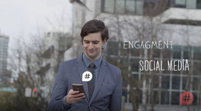 Business man looking at a cell phone with a hashtag for social media