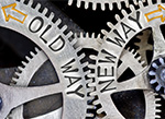 Gears labeled Old Way and New Way