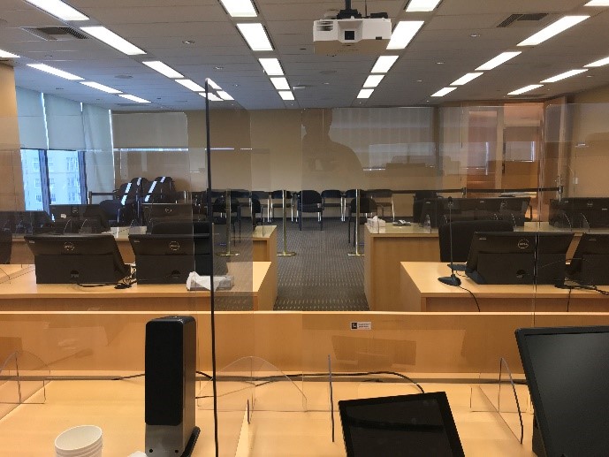 Barriers at the hearings officers tables